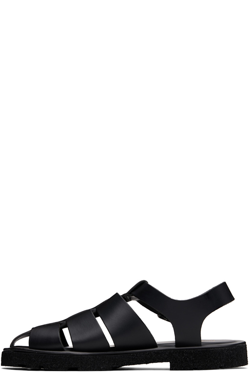 Woven buffed leather sandals in black.

· Pin-buckle ankle strap
· Logo stamp at padded footbed
· Treaded Rubex® rubber sole

Supplier color: Black