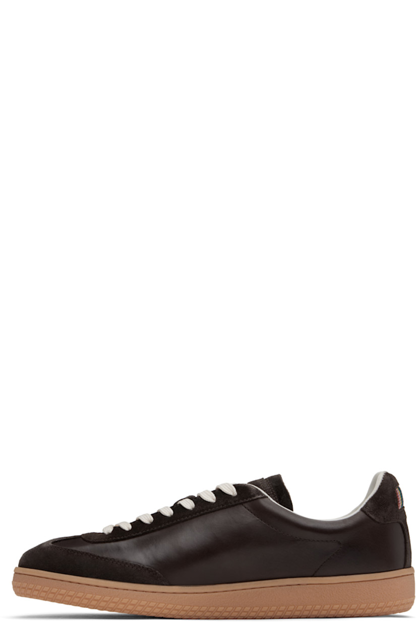 Low-top buffed calfskin and suede sneakers in brown.

· Lace-up closure
· Logo embossed at padded tongue
· Padded collar
· Logo hardware at outer side
· Signature stripe grosgrain trim at heel tab
· Buffed leather and suede lining
· Treaded Vibram® rubber sole

Supplier color: Brown