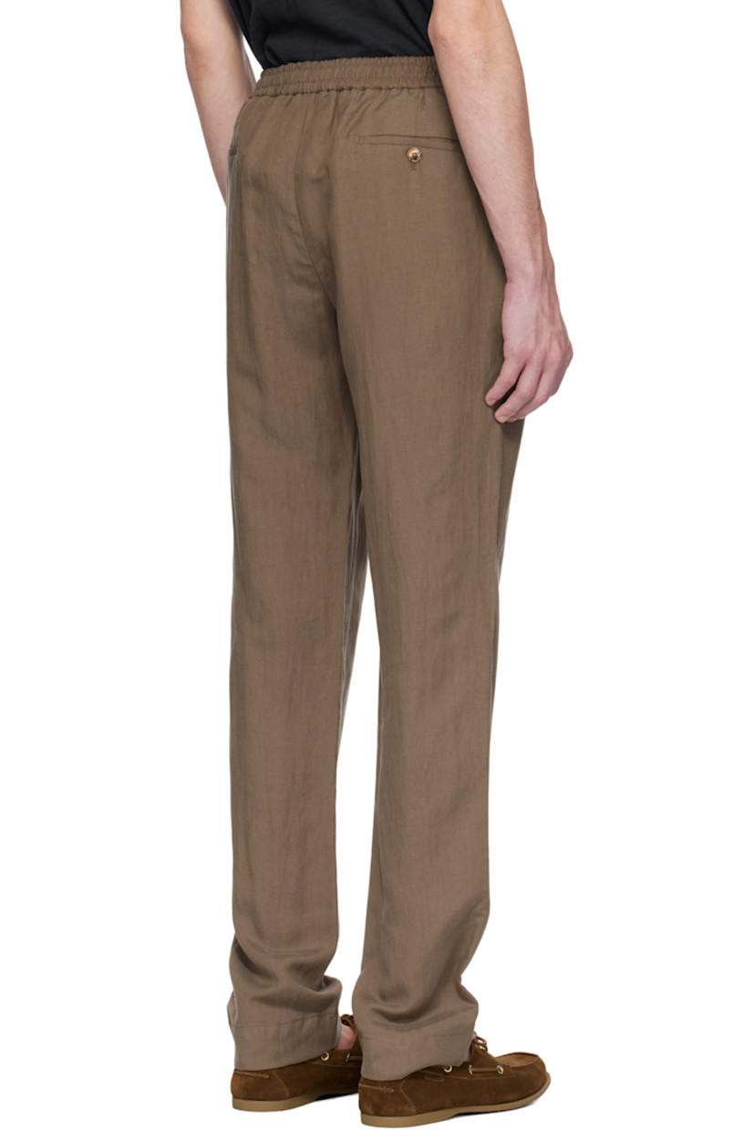 Lightweight washed silk- and linen-blend hopsack trousers. 

· Concealed drawstring at elasticized waistband
· Four-pocket styling
· Zip fly
· Pleats at front 
· Mother-of-pearl hardware

Supplier color: Espresso