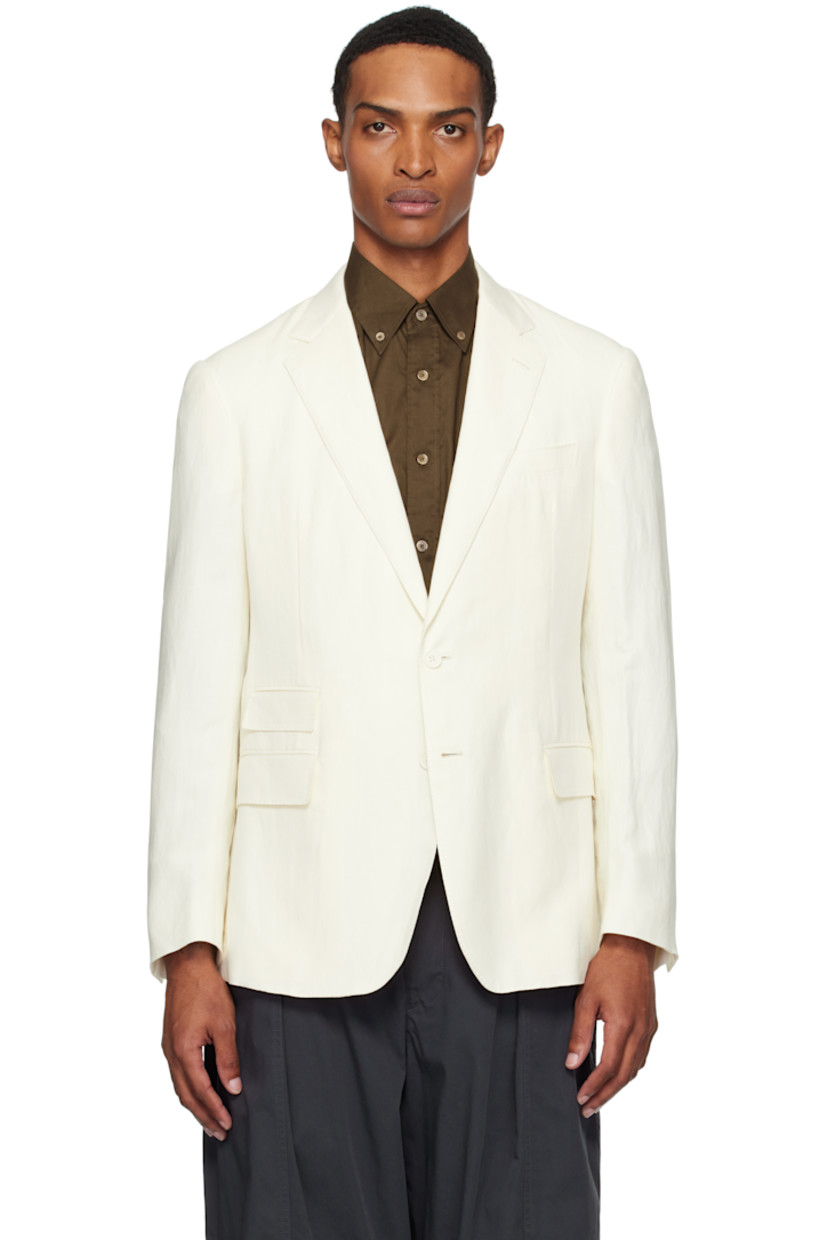 Silk- and linen-blend hopsack blazer.

· Notched lapel
· Button closure
· Welt pocket at chest
· Flap pockets
· Padded shoulders
· Surgeon's cuffs
· Vents at back hem
· Welt pockets at interior
· Partial cupro satin lining

Supplier color: Classic cream