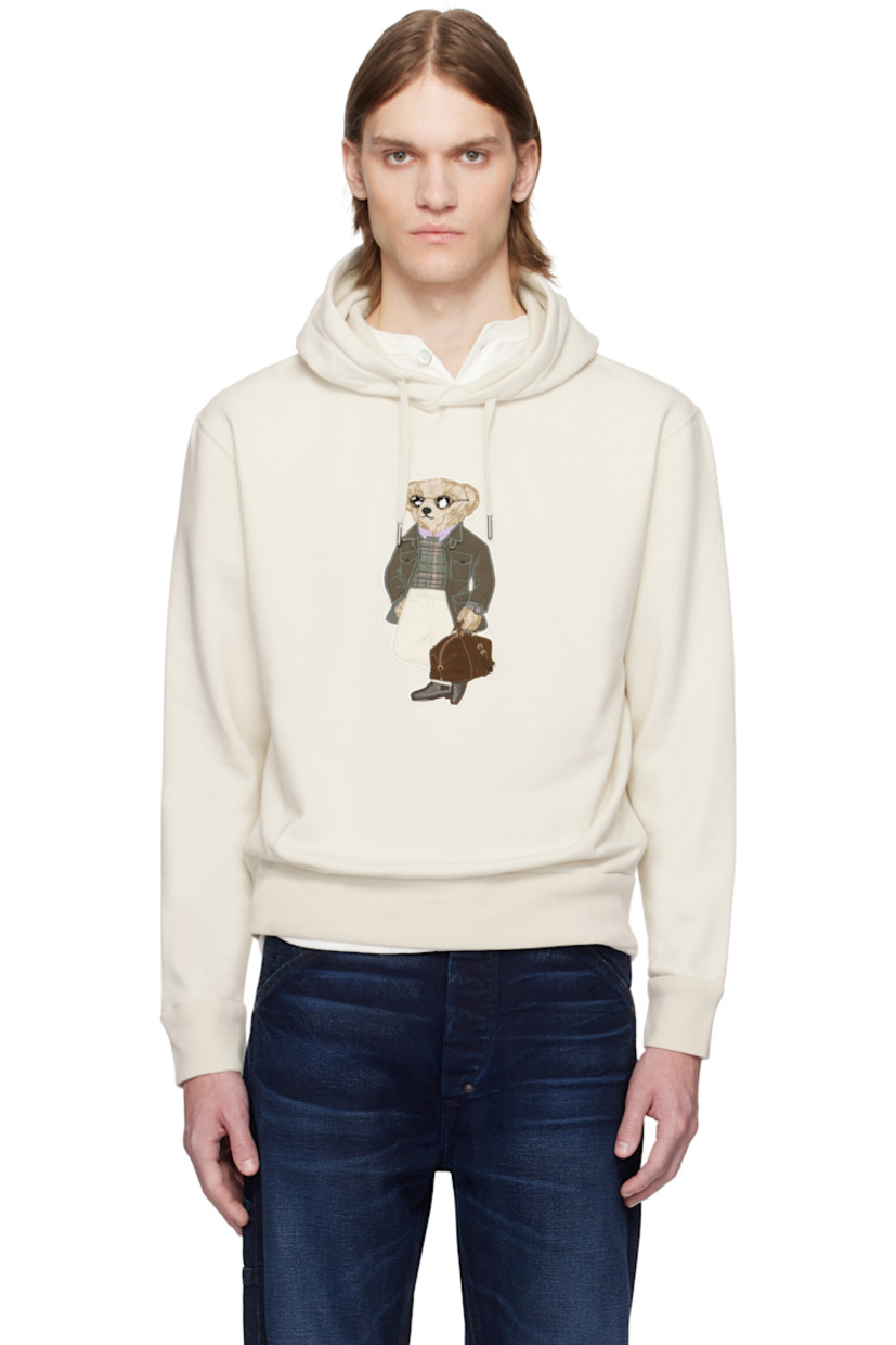 Cotton-blend fleece hoodie. 

· Drawstring at hood
· Logo graphic appliqué at front 
· Rib-knit hem and cuffs

Supplier color: Classic cream