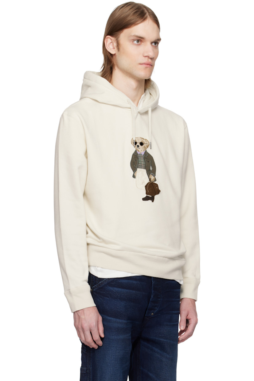 Cotton-blend fleece hoodie. 

· Drawstring at hood
· Logo graphic appliqué at front 
· Rib-knit hem and cuffs

Supplier color: Classic cream