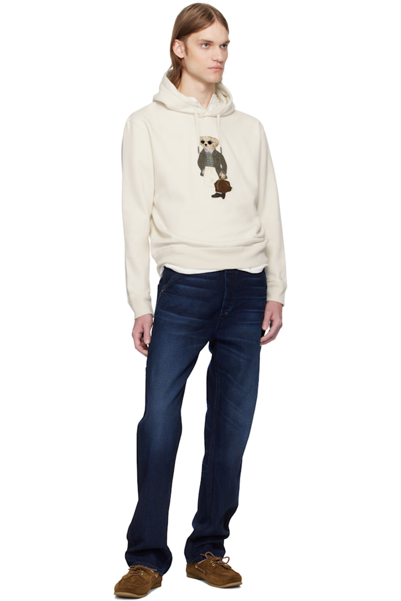 Cotton-blend fleece hoodie. 

· Drawstring at hood
· Logo graphic appliqué at front 
· Rib-knit hem and cuffs

Supplier color: Classic cream