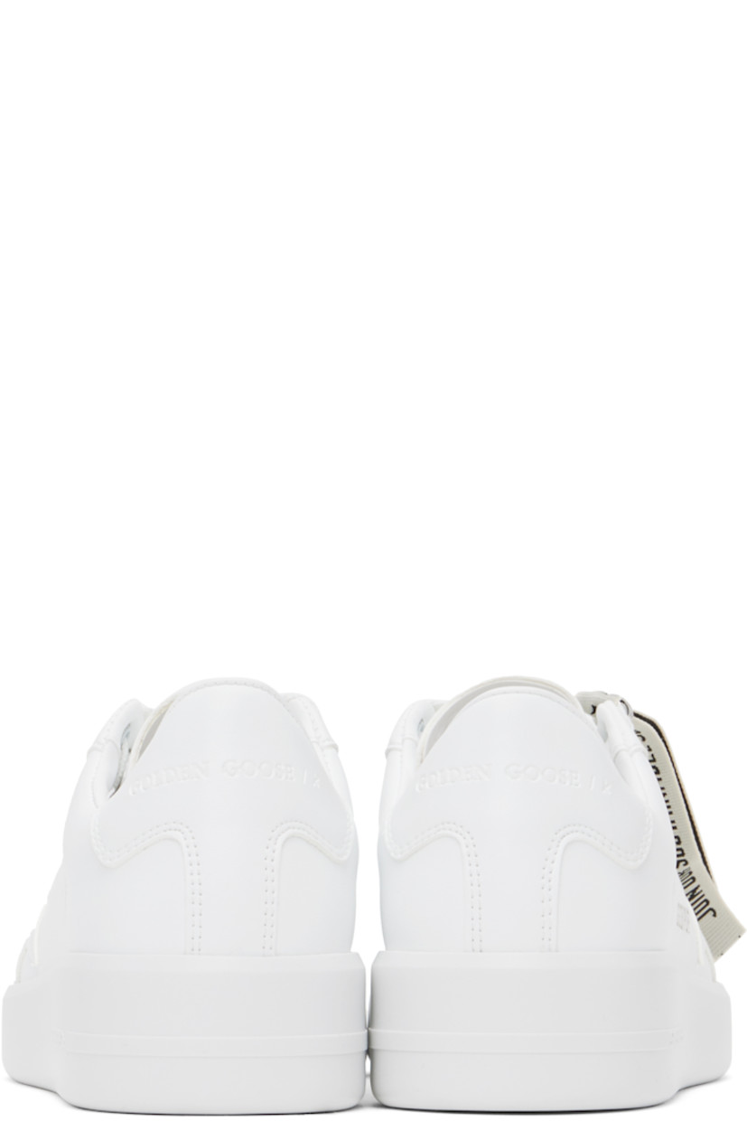 Handcrafted low-top bio-based buffed faux-leather sneakers in white.

· Lace-up closure
· Logo embossed at tongue and heel tab
· Padded collar
· Perforated detailing at sides
· Signature star appliqué at outer side
· Gold-tone logo stamp at outer side
· Grained leather lining
· Logo embossed at treaded rubber sole

Supplier color: Optic white