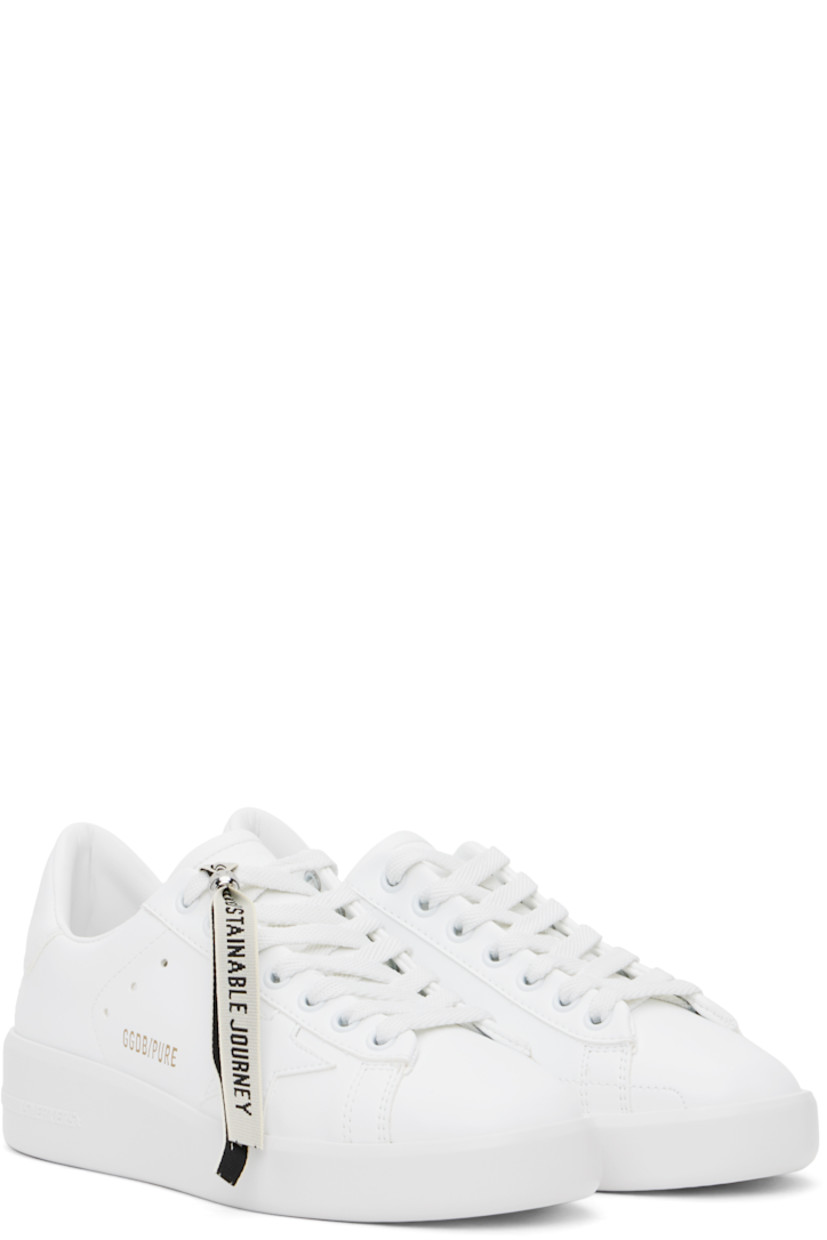 Handcrafted low-top bio-based buffed faux-leather sneakers in white.

· Lace-up closure
· Logo embossed at tongue and heel tab
· Padded collar
· Perforated detailing at sides
· Signature star appliqué at outer side
· Gold-tone logo stamp at outer side
· Grained leather lining
· Logo embossed at treaded rubber sole

Supplier color: Optic white
