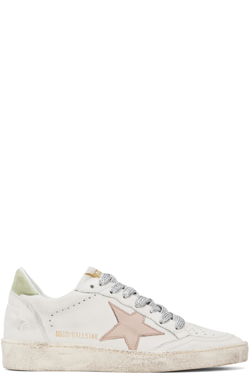Handcrafted low-top grained leather sneakers in white.

· Smudging and perforated detailing throughout
· Lace-up closure
· Logo patch at padded tongue
· Padded collar
· Star appliqué and logo stamp at outer side
· Text embossed at heel counter
· Terrycloth, suede, and buffed leather lining
· Treaded rubber sole

Supplier color: White/Moonlight pink