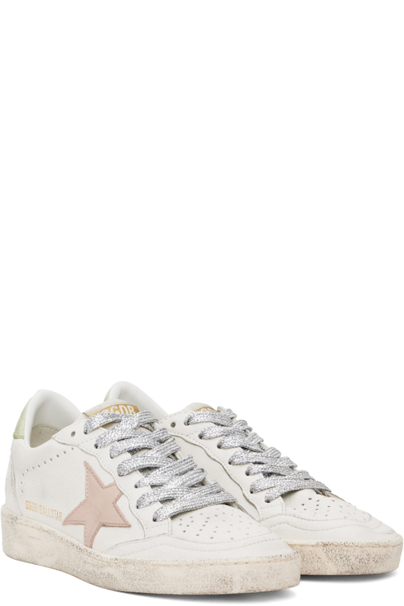 Handcrafted low-top grained leather sneakers in white.

· Smudging and perforated detailing throughout
· Lace-up closure
· Logo patch at padded tongue
· Padded collar
· Star appliqué and logo stamp at outer side
· Text embossed at heel counter
· Terrycloth, suede, and buffed leather lining
· Treaded rubber sole

Supplier color: White/Moonlight pink