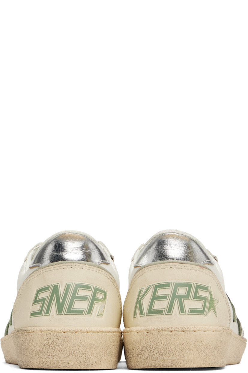 Handcrafted low-top buffed leather sneakers in off-white and khaki.

· Smudging and perforations throughout
· Lace-up closure
· Logo flag at tongue
· Padded collar
· Grained leather star appliqué at outer side
· Logo stamp at outer side
· Text embossed at heel counter
· Grained leather, suede, and terrycloth lining
· Treaded rubber sole

Supplier color: White/Green/Silver