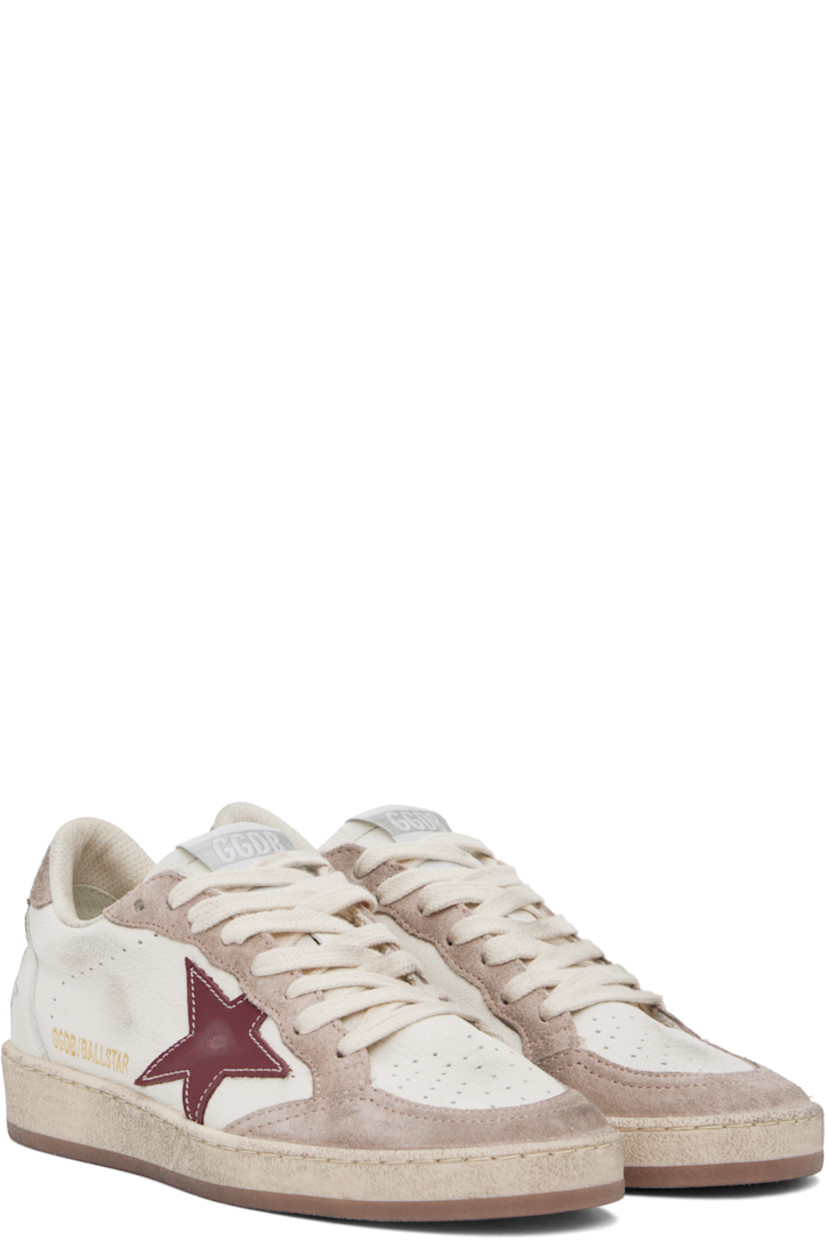 Handcrafted low-top grained leather and suede sneakers in white and pink.

· Smudging and perforated detailing throughout
· Lace-up closure
· Logo patch at padded tongue
· Padded collar
· Star appliqué and logo stamp at outer side
· Text embossed at heel counter
· Terrycloth, suede, and buffed leather lining
· Treaded rubber sole

Supplier color: White/Red/Pink