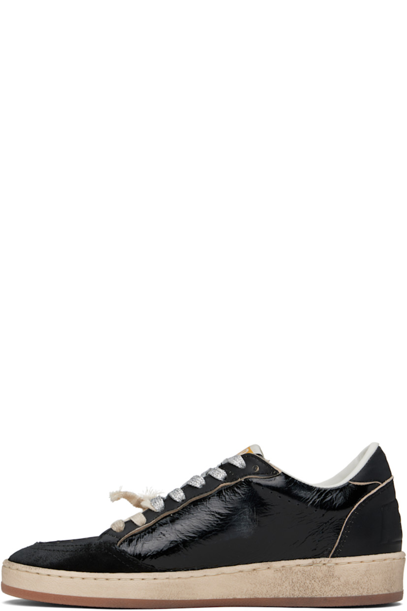 Handcrafted low-top paneled suede and buffed leather sneakers in black.

· Smudging, distressing, and perforated detailing throughout
· Lace-up closure
· Logo patch at padded tongue
· Padded collar
· Signature star appliqué at outer side
· Logo stamp at outer side
· Logo embossed at heel
· Suede, buffed leather, and terrycloth lining
· Treaded rubber sole

Supplier color: Black/Off-White
