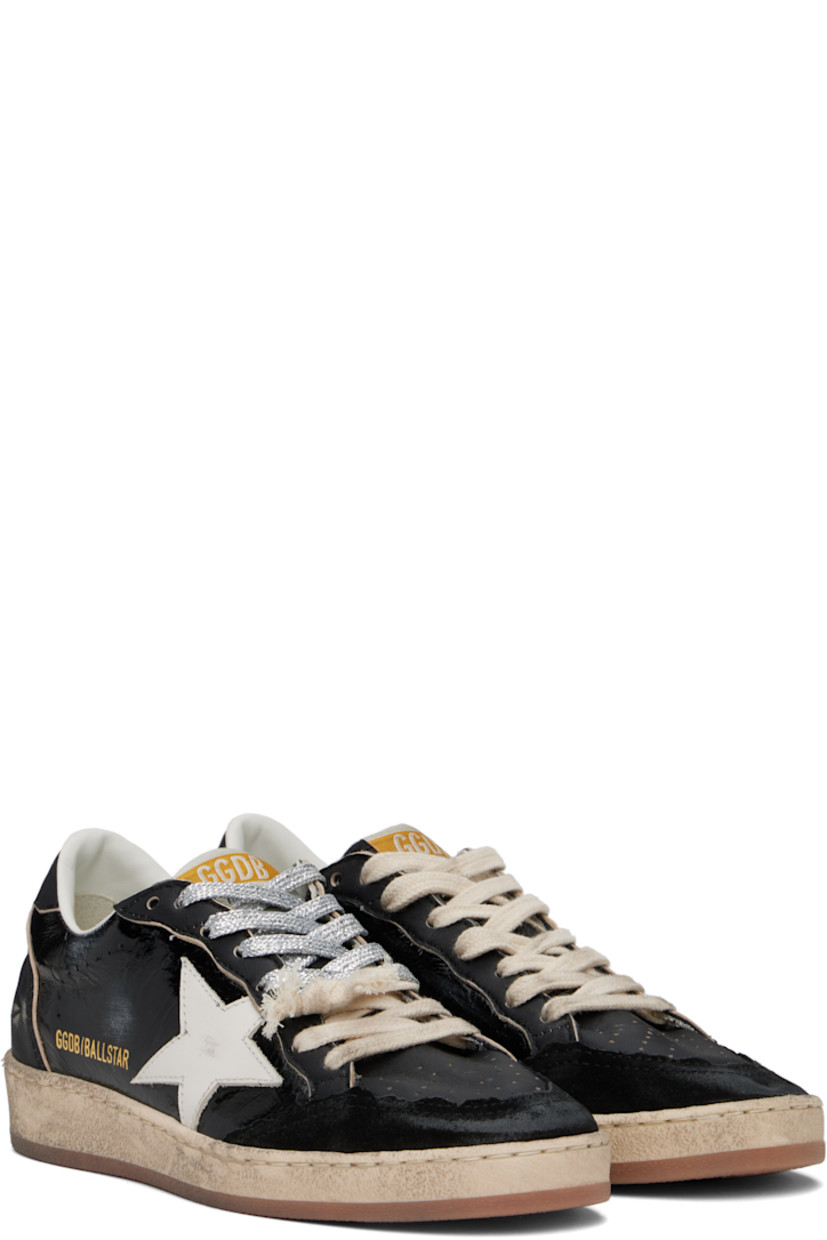 Handcrafted low-top paneled suede and buffed leather sneakers in black.

· Smudging, distressing, and perforated detailing throughout
· Lace-up closure
· Logo patch at padded tongue
· Padded collar
· Signature star appliqué at outer side
· Logo stamp at outer side
· Logo embossed at heel
· Suede, buffed leather, and terrycloth lining
· Treaded rubber sole

Supplier color: Black/Off-White