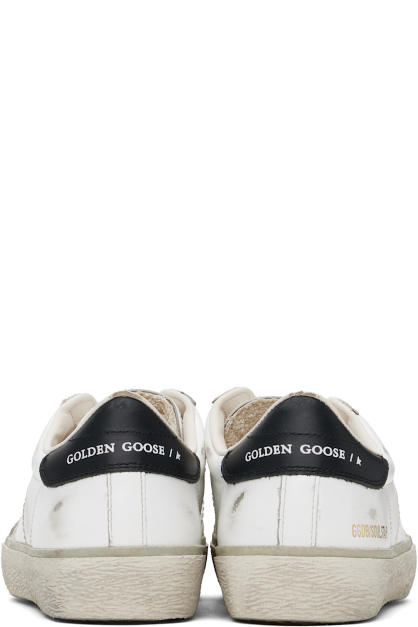 Low-top buffed leather sneakers in white.

· Distressing and smudging throughout
· Lace-up closure
· Logo embossed at padded tongue
· Padded collar
· Logo stamp at outer side
· Logo embossed at heel tab
· Buffed leather and terrycloth lining
· Textured rubber midsole
· Treaded rubber sole

Supplier color: White/Black