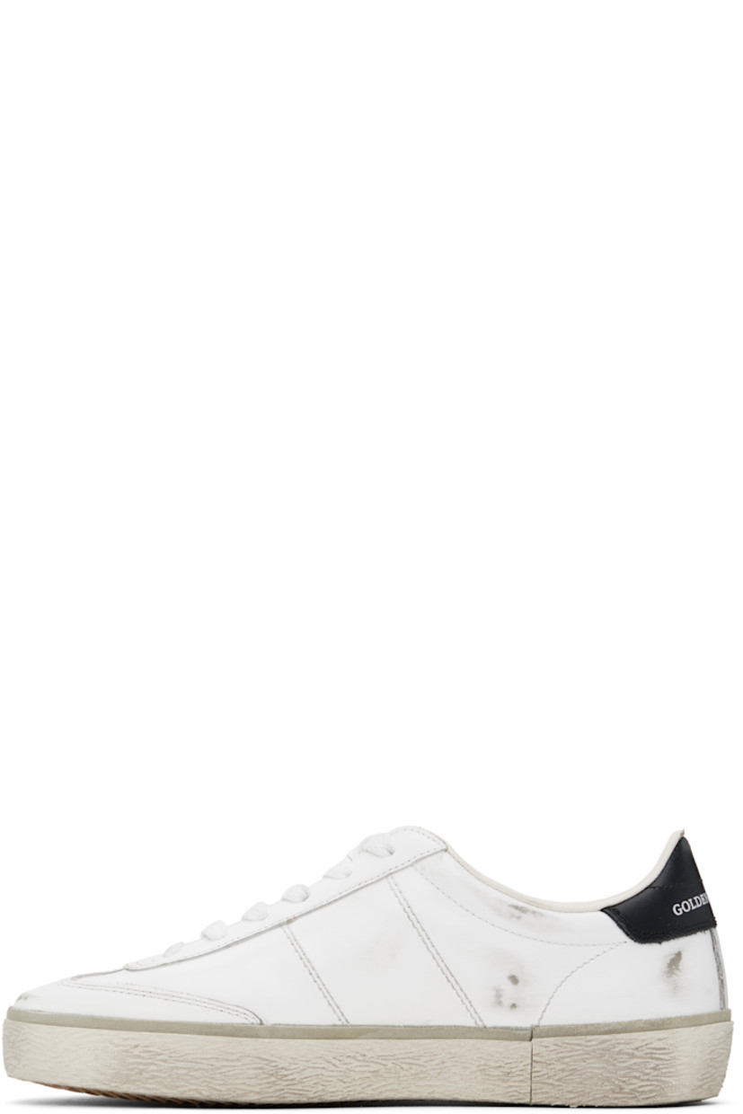 Low-top buffed leather sneakers in white.

· Distressing and smudging throughout
· Lace-up closure
· Logo embossed at padded tongue
· Padded collar
· Logo stamp at outer side
· Logo embossed at heel tab
· Buffed leather and terrycloth lining
· Textured rubber midsole
· Treaded rubber sole

Supplier color: White/Black