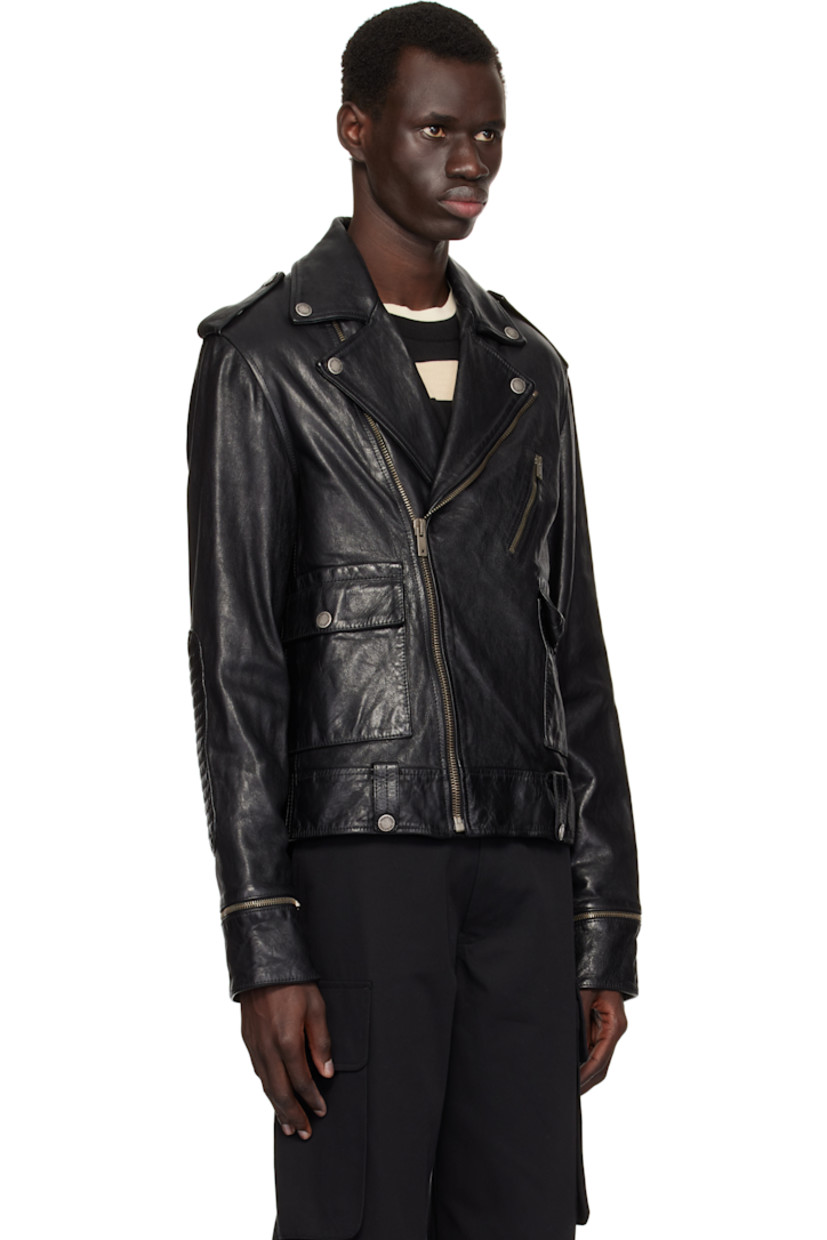 Crinkled nappa sheepskin jacket. 

· Press-stud fastening at notched lapel
· Off-set zip and press-stud closure
· Flap pockets
· Press-stud belt loops at hem
· Press-stud epaulettes
· Quilted elbow patches
· Detachable zip panel at cuffs
· Logo hardware at back collar
· Zip vent and quilted panel at back hem
· Welt pockets at interior
· Full quilted satin lining

Part of the Journey collection.

Supplier color: Black