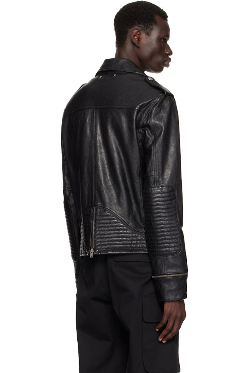 Crinkled nappa sheepskin jacket. 

· Press-stud fastening at notched lapel
· Off-set zip and press-stud closure
· Flap pockets
· Press-stud belt loops at hem
· Press-stud epaulettes
· Quilted elbow patches
· Detachable zip panel at cuffs
· Logo hardware at back collar
· Zip vent and quilted panel at back hem
· Welt pockets at interior
· Full quilted satin lining

Part of the Journey collection.

Supplier color: Black