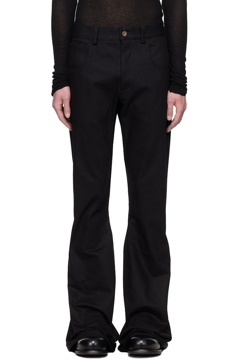 Handcrafted non-stretch denim jeans.

· Slim-fit
· Belt loops
· Five-pocket styling
· Button fly
· Flared cuffs
· Twisted inseams

Supplier color: Black