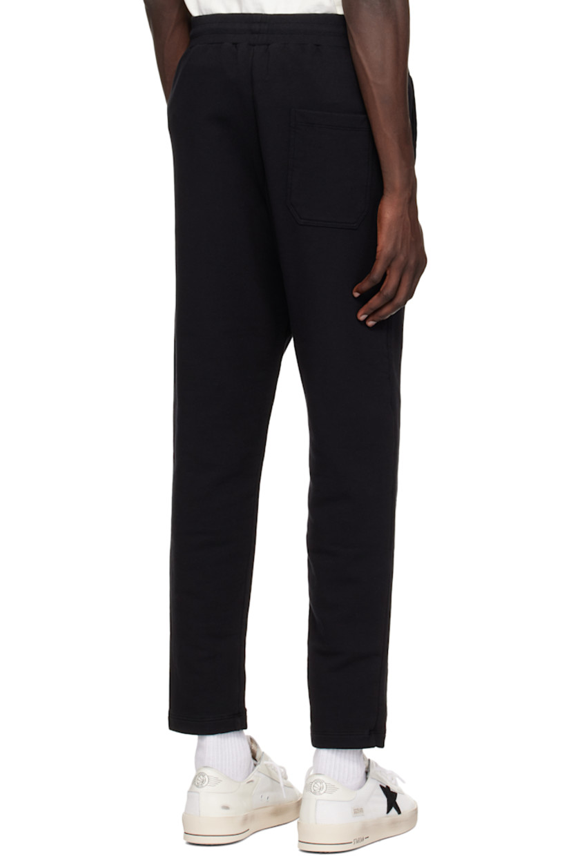 Tapered French terry sweatpants. 

· Concealed drawstring at elasticized waistband
· Three-pocket styling
· Pinched seam at legs
· Logo printed at front

Part of the Star collection.

Supplier color: Black