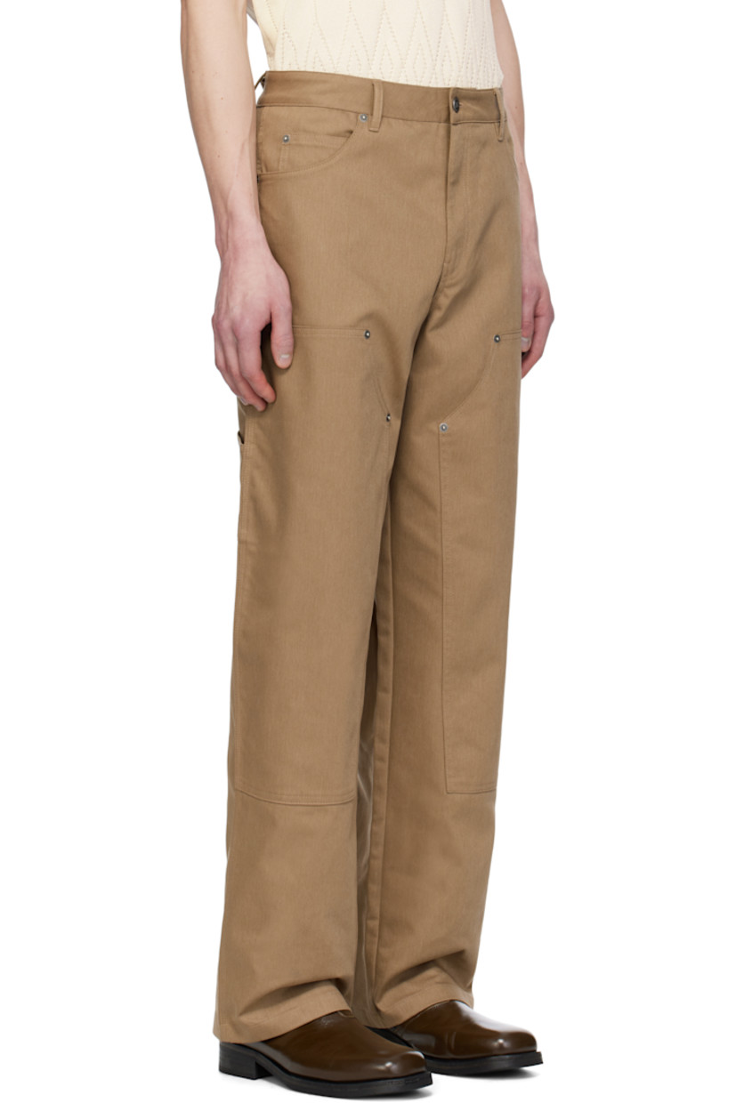 Heavyweight stretch cotton-blend twill trousers. 

· Belt loops 
· Five-pocket styling 
· Zip fly
· Rivets at front and back 
· Panel at legs
· Hammer loop and patch pocket at outseam
· Patch pockets at outseam
· Logo hardware at back
· Logo-engraved silver-tone hardware

Part of the Journey collection.

Supplier color: Khaki beige
