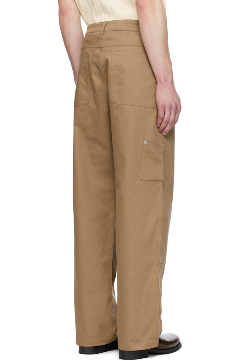 Heavyweight stretch cotton-blend twill trousers. 

· Belt loops 
· Five-pocket styling 
· Zip fly
· Rivets at front and back 
· Panel at legs
· Hammer loop and patch pocket at outseam
· Patch pockets at outseam
· Logo hardware at back
· Logo-engraved silver-tone hardware

Part of the Journey collection.

Supplier color: Khaki beige