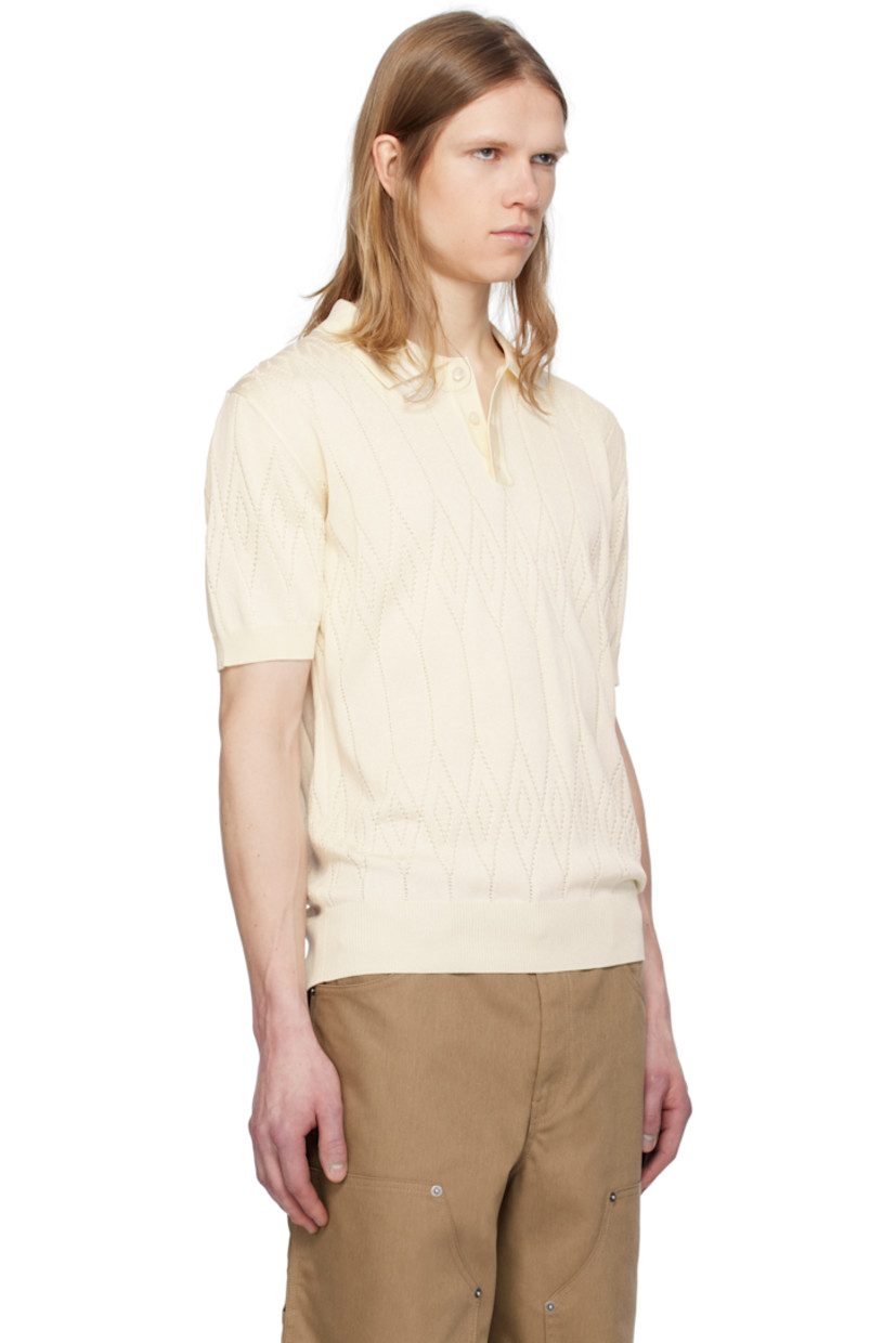 Pointelle-knit cotton- and viscose-blend polo. Argyle pattern throughout. 

· Rib-knit spread collar, placket, hem, and cuffs 
· Three-button placket 
· Logo hardware at back collar 

Part of the Journey collection.

Supplier color: Heritage white