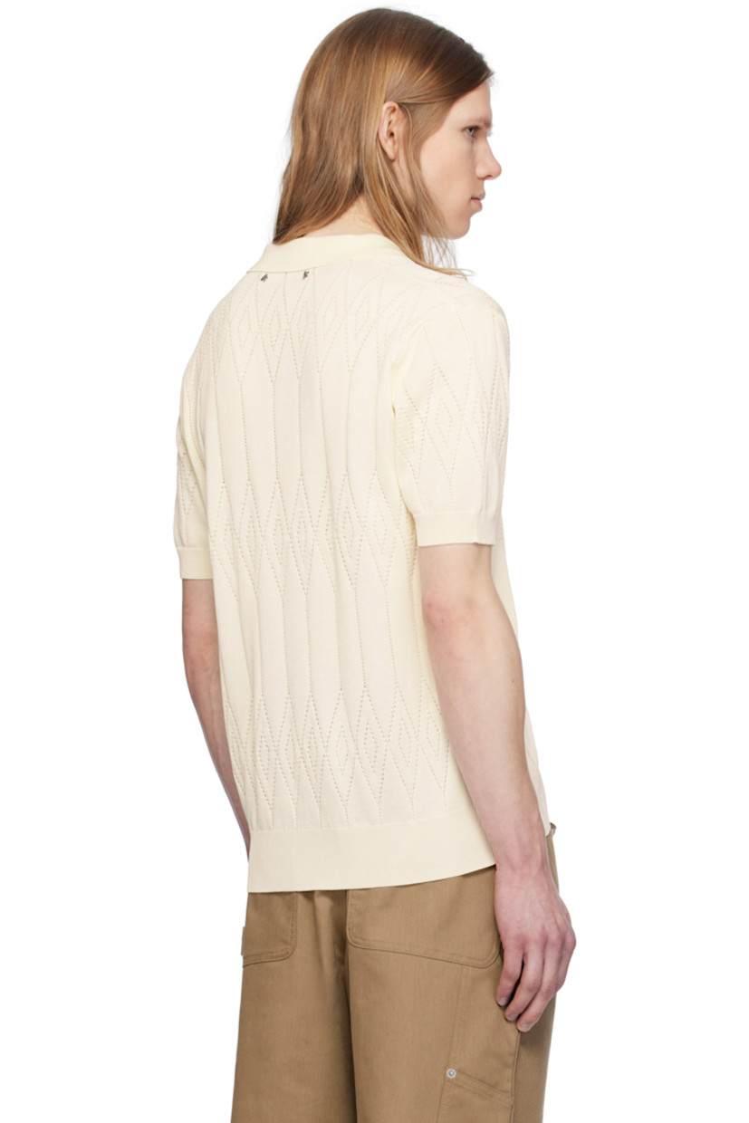 Pointelle-knit cotton- and viscose-blend polo. Argyle pattern throughout. 

· Rib-knit spread collar, placket, hem, and cuffs 
· Three-button placket 
· Logo hardware at back collar 

Part of the Journey collection.

Supplier color: Heritage white