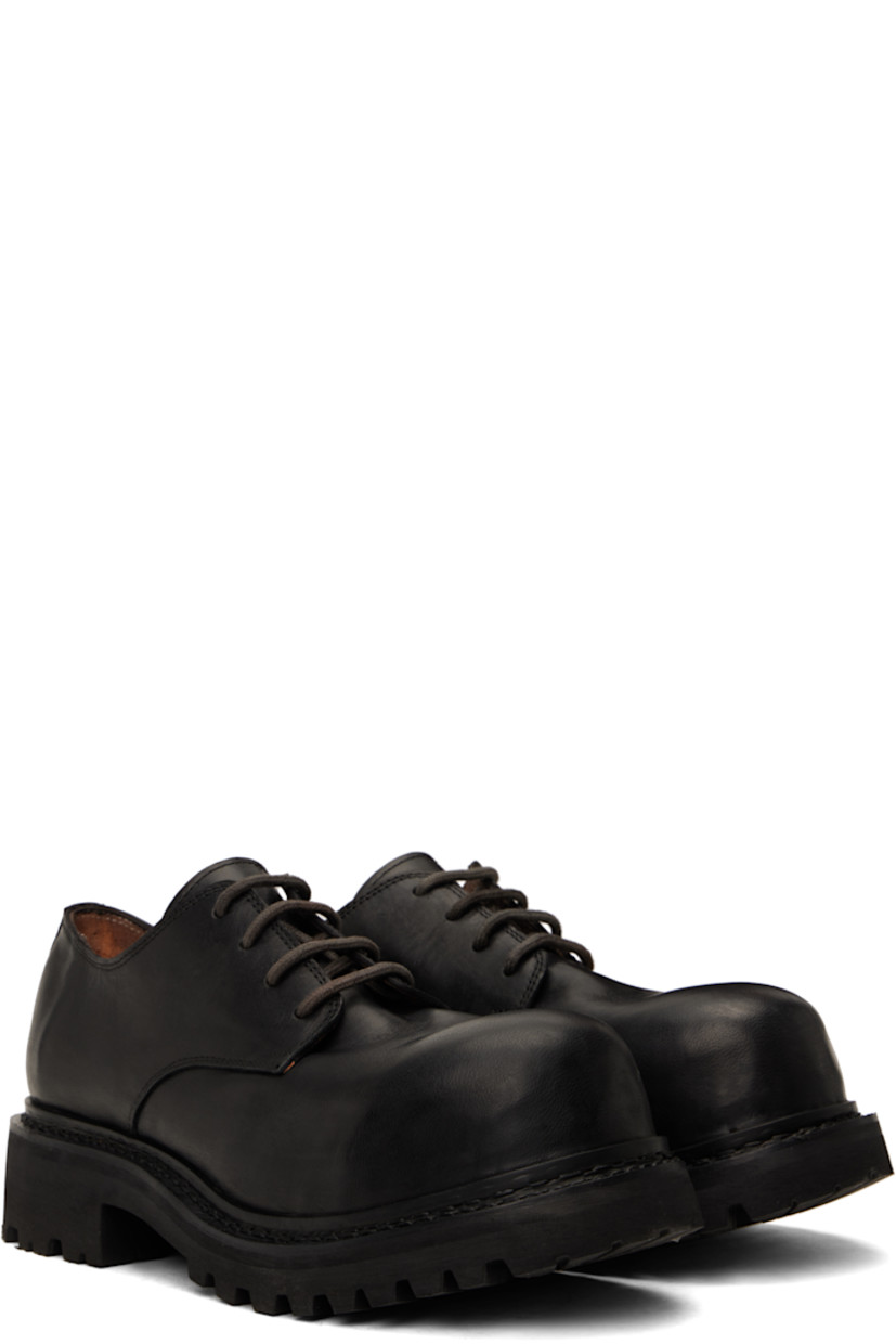 Handcrafted grained horse leather derbys in black.

· Encased metal toe
· Lace-up closure
· Buffed leather and suede lining
· Textured rubber midsole and heel
· Margom® lugged rubber sole
· Heel: H1.75"

Supplier color: Black