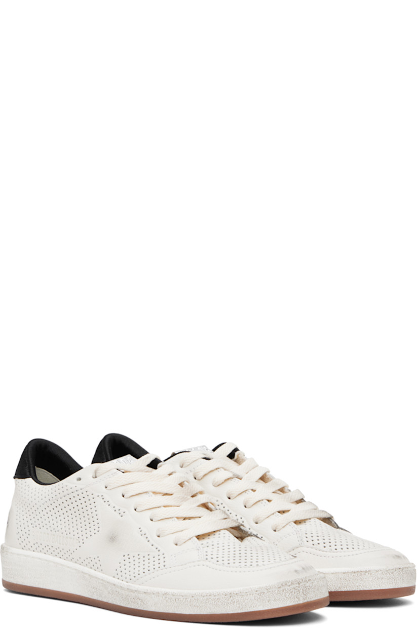 Handcrafted low-top grained faux-leather sneakers in white. 

· Smudging and perforations throughout 
· Lace-up closure
· Logo flag at padded tongue
· Padded collar 
· Star appliqué at outer side
· Jersey heel tab 
· Text printed at heel counter 
· Terrycloth lining  
· Treaded rubber sole 

Supplier color: White/Black