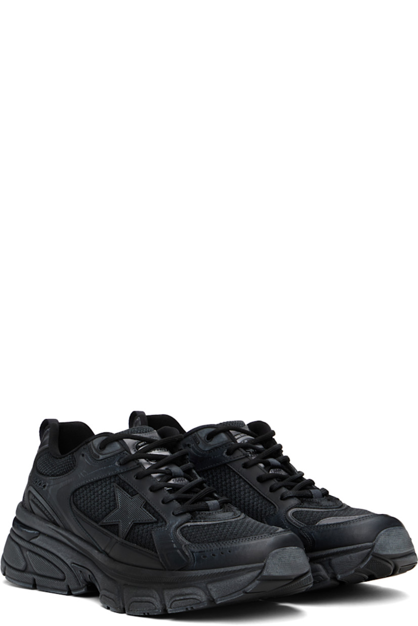 Handcrafted low-top paneled mesh, buffed leather, and sheepskin suede sneakers in black.

· Smudging throughout
· Perforated detailing at toe
· Lace-up closure
· Logo patch at padded tongue 
· Padded collar
· Signature star appliqué at outer side
· Pull-loop at heel tab
· Logo printed at heel
· Treaded rubber sole

Supplier color: Black