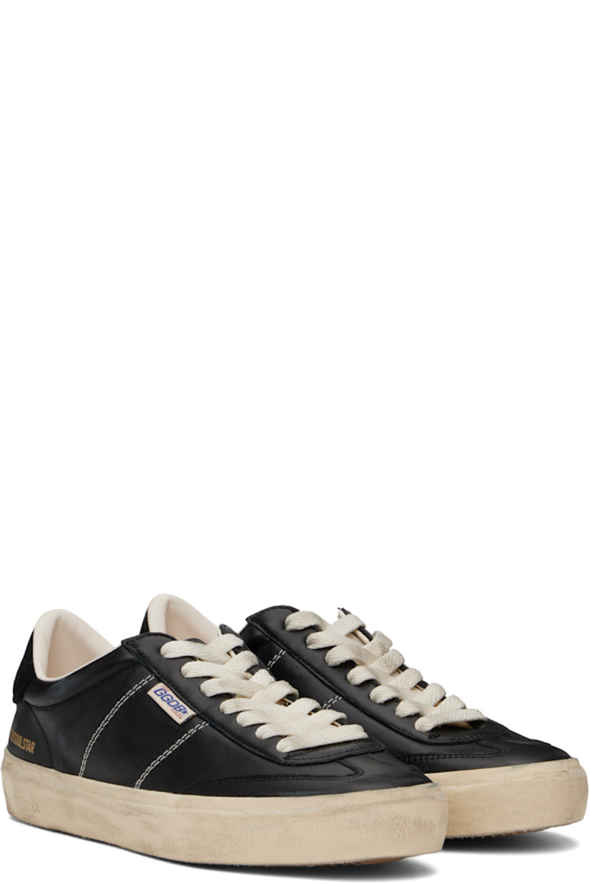 Low-top handcrafted buffed sheepskin sneakers in black.

· Smudging throughout
· Lace-up closure
· Logo patch at padded tongue
· Padded collar
· Logo flag and stamp at outer side
· Contrast stitching at sides
· Logo printed at suede heel tab
· Buffed leather and terrycloth lining
· Treaded rubber sole

Supplier color: Black