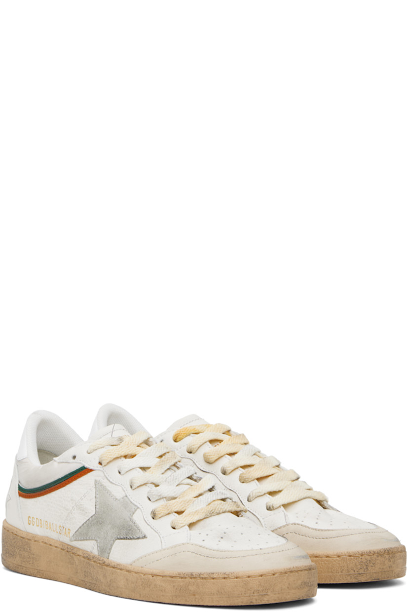 Handcrafted low-top nappa lambskin and buffed leather sneakers in white and beige.

· Smudging and subtle distressing throughout
· Perforations at toe
· Lace-up closure
· Text and logo printed at tongue
· Padded collar
· Star appliqué and logo stamp at outer side
· Text embossed at heel counter
· Suede, mesh, and terrycloth lining
· Treaded rubber sole

Supplier color: White/Beige/Ice/Green/Orange