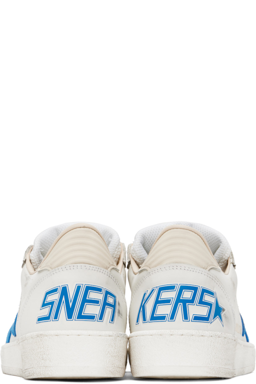 Handcrafted low-top grained leather sneakers in white. 

· Smudging and subtle distressing throughout 
· Crackled trim and perforations at toe
· Lace-up closure
· Logo stamp at padded mesh tongue 
· Star appliqué and logo stamp at outer side
· Perforations at sides
· Stripes embossed at heel tab 
· Logo printed at heel counter 
· Buffed leather, suede, and terrycloth lining 
· Treaded rubber sole 

Supplier color: White/Bluette/Wood