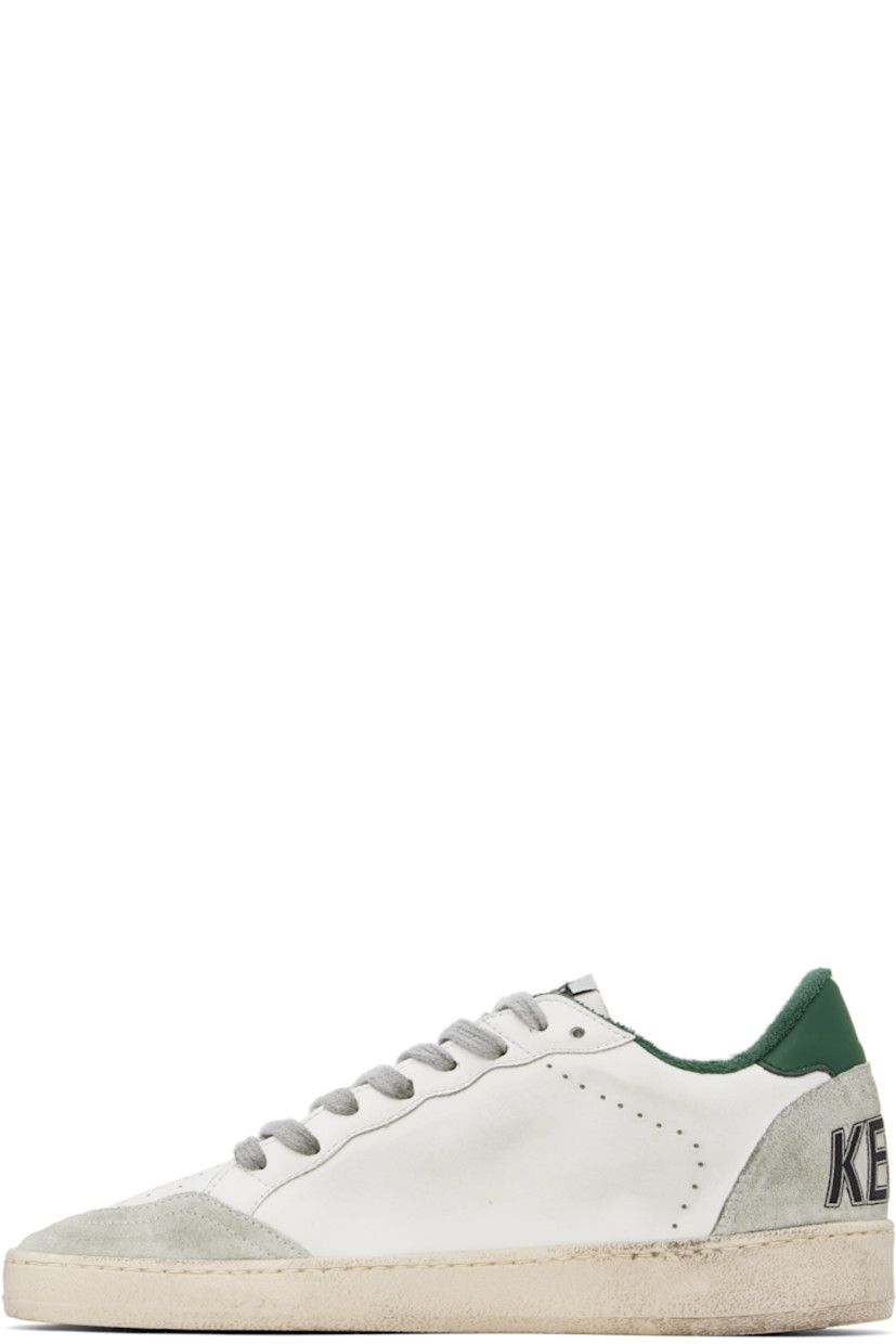 Handcrafted low-top buffed nappa sheepskin and suede sneakers in white and green.

· Smudging and perforated detailing throughout
· Lace-up closure
· Logo patch at padded tongue
· Padded collar
· Logo stamp and star appliqué at outer side
· Text printed at heel counter
· Grained leather and terrycloth lining
· Treaded rubber sole

Supplier color: White/Ice/Green