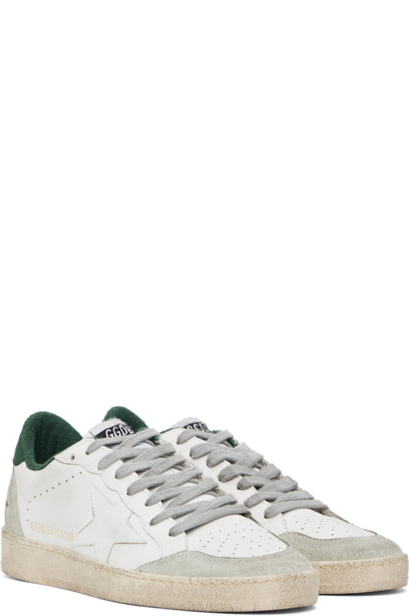 Handcrafted low-top buffed nappa sheepskin and suede sneakers in white and green.

· Smudging and perforated detailing throughout
· Lace-up closure
· Logo patch at padded tongue
· Padded collar
· Logo stamp and star appliqué at outer side
· Text printed at heel counter
· Grained leather and terrycloth lining
· Treaded rubber sole

Supplier color: White/Ice/Green