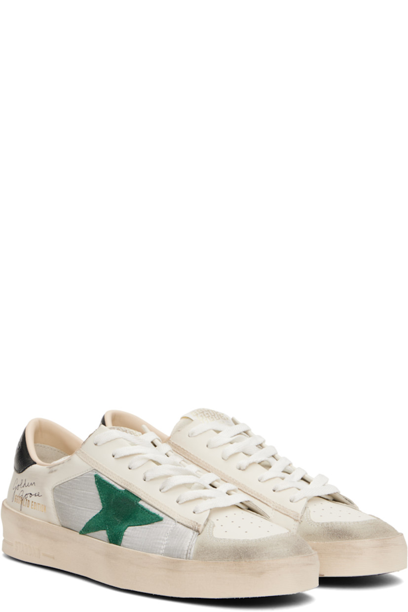 Handcrafted low-top paneled grained leather, suede, and ripstop sneakers in white.

· Smudging and subtle distressing throughout
· Perforations at toe and inner side
· Lace-up closure
· Logo flag at padded tongue
· Padded collar
· Logo stamp and star appliqué at outer side
· Logo printed at outer side and heel tab
· Buffed leather, suede, and terrycloth lining
· Logo embossed at foam rubber midsole
· Treaded rubber sole

Supplier color: White/Silver/Black/Green
