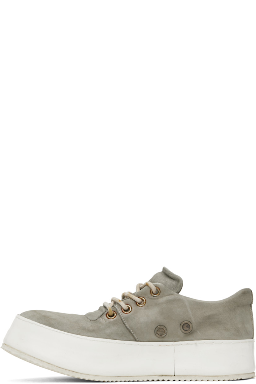 Handcrafted low-top grained goatskin sneakers in gray.

· Smudging and distressing throughout
· Lace-up closure
· Padded collar
· Eyelets at inner side
· Extended rubber welt
· Treaded rubber sole
· Contrast stitching in white

Supplier color: Grey