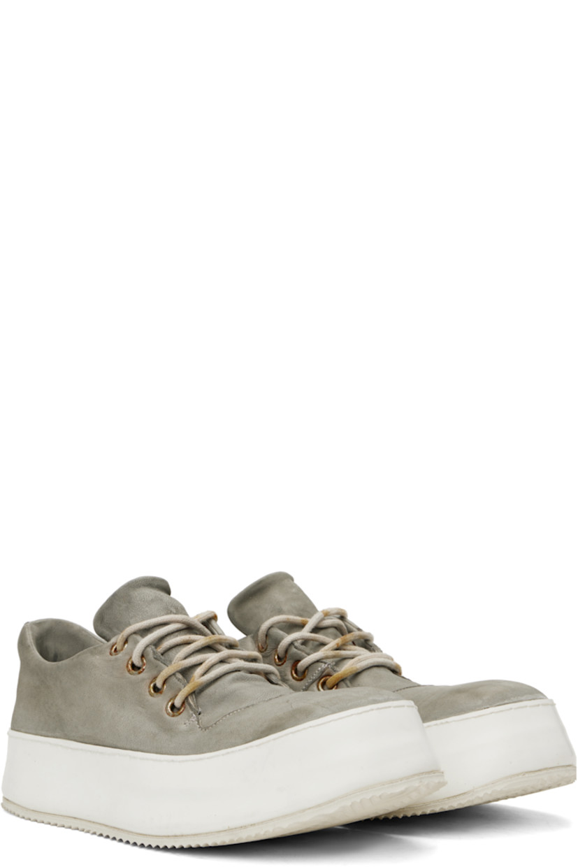 Handcrafted low-top grained goatskin sneakers in gray.

· Smudging and distressing throughout
· Lace-up closure
· Padded collar
· Eyelets at inner side
· Extended rubber welt
· Treaded rubber sole
· Contrast stitching in white

Supplier color: Grey