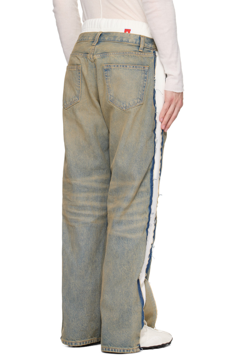 Non-stretch denim and cotton fleece jeans. Fading, whiskering, and distressing throughout. 

· Layered and paneled construction
· Drawstring elasticized waistband
· Belt loops
· Five-pocket styling
· Button fly
· Logo printed at front legs
· Elasticized cuffs
· Frayed edge at vented outseams
· Logo patch at back waistband

Supplier color: Light indigo