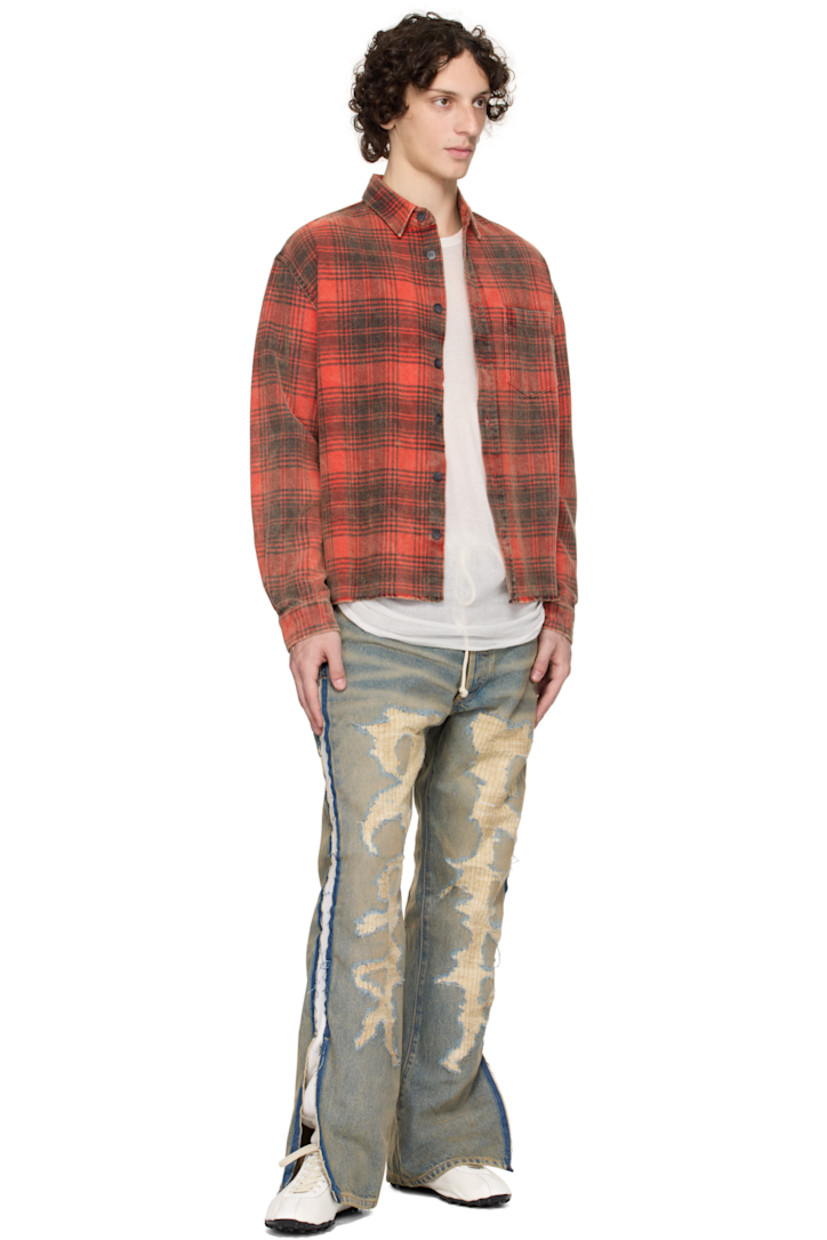 Non-stretch denim and cotton fleece jeans. Fading, whiskering, and distressing throughout. 

· Layered and paneled construction
· Drawstring elasticized waistband
· Belt loops
· Five-pocket styling
· Button fly
· Logo printed at front legs
· Elasticized cuffs
· Frayed edge at vented outseams
· Logo patch at back waistband

Supplier color: Light indigo