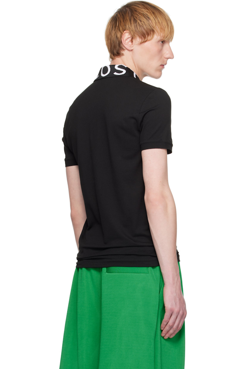 Lightweight stretch organic cotton piqué polo.

· Rib-knit spread collar with jacquard logo
· Two-button placket
· Logo graphic patch at chest
· Rib-knit cuffs

Supplier color: Black