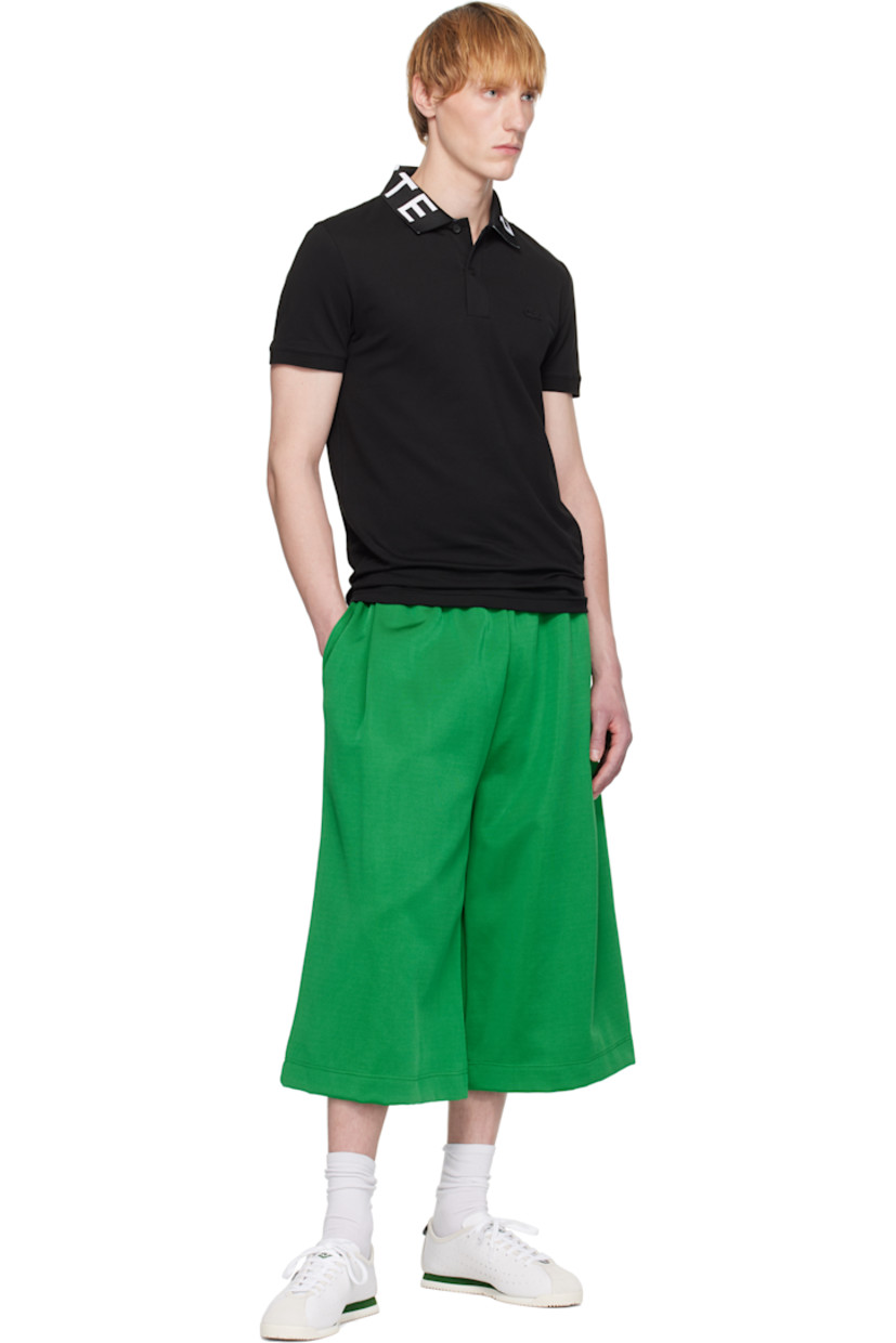 Lightweight stretch organic cotton piqué polo.

· Rib-knit spread collar with jacquard logo
· Two-button placket
· Logo graphic patch at chest
· Rib-knit cuffs

Supplier color: Black