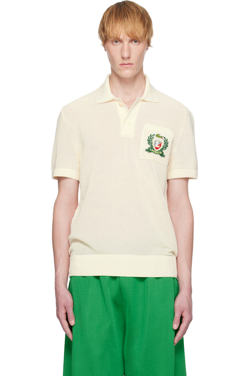 12-gauge piqué knit organic cotton polo.

· Rib-knit spread collar, hem, and cuffs
· Two-button placket
· Logo embroidered at patch pocket

Supplier color: Cream