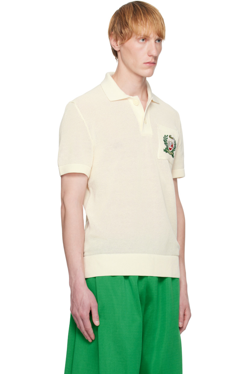 12-gauge piqué knit organic cotton polo.

· Rib-knit spread collar, hem, and cuffs
· Two-button placket
· Logo embroidered at patch pocket

Supplier color: Cream