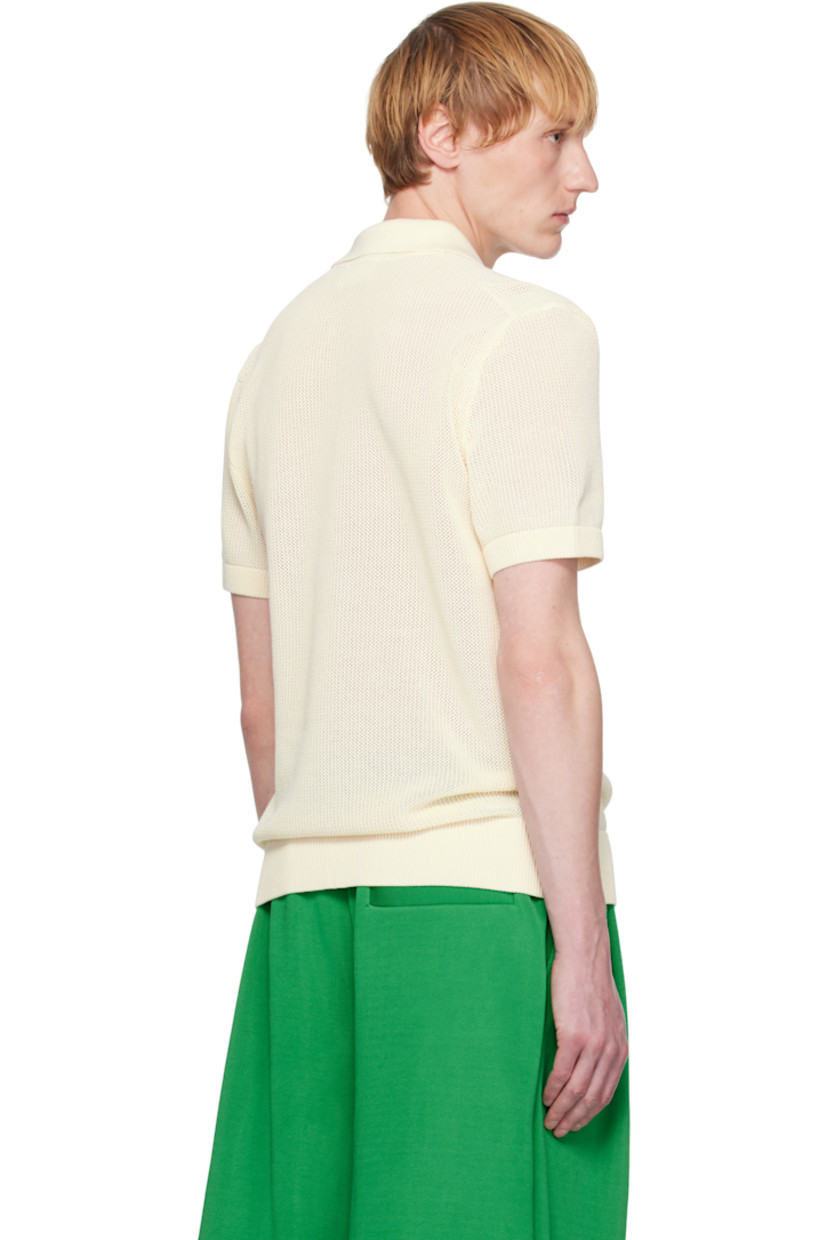 12-gauge piqué knit organic cotton polo.

· Rib-knit spread collar, hem, and cuffs
· Two-button placket
· Logo embroidered at patch pocket

Supplier color: Cream