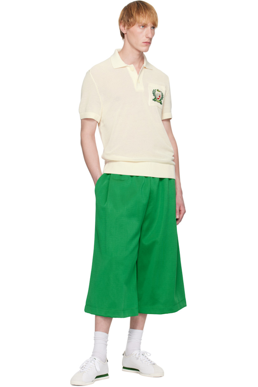 12-gauge piqué knit organic cotton polo.

· Rib-knit spread collar, hem, and cuffs
· Two-button placket
· Logo embroidered at patch pocket

Supplier color: Cream