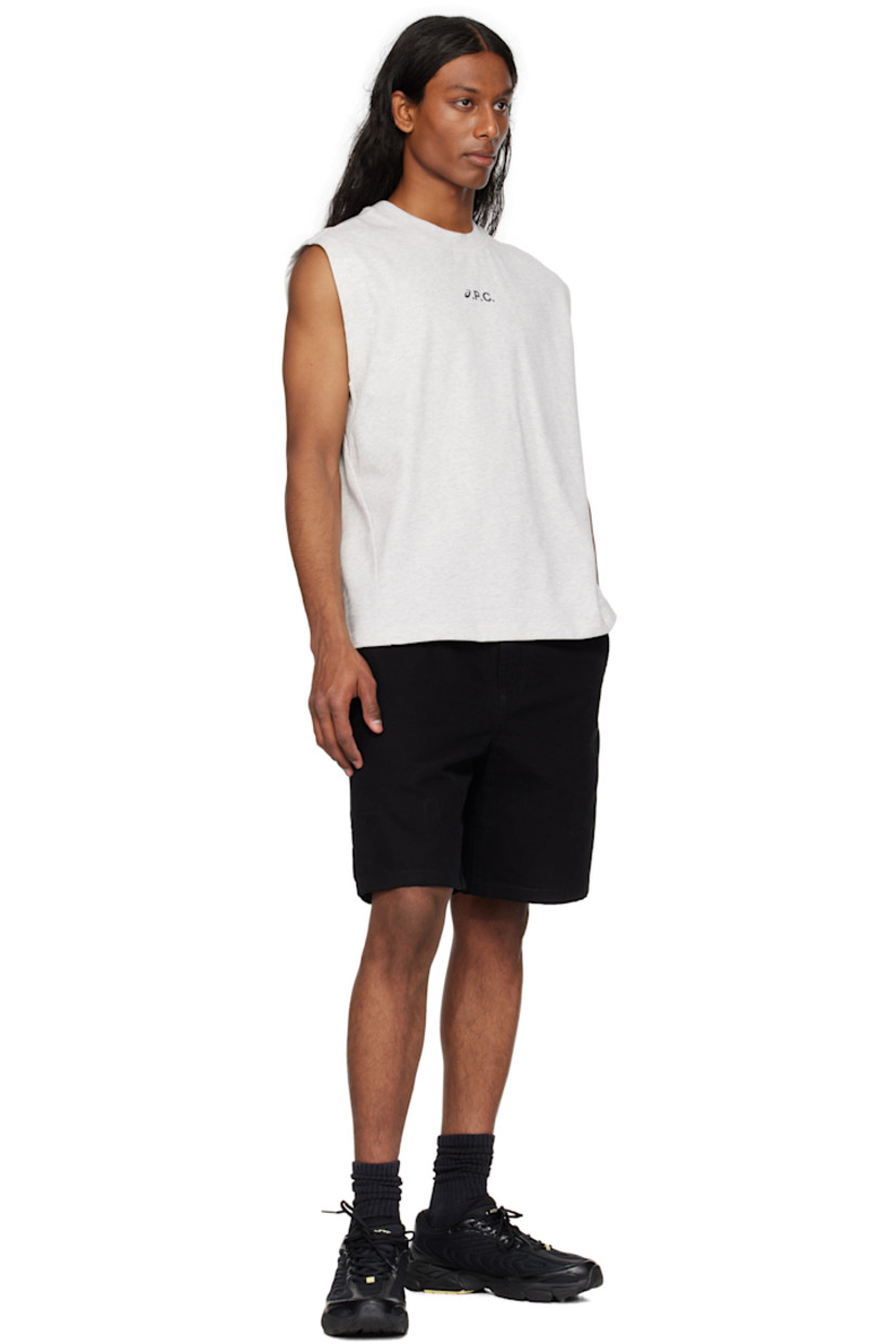 Low-top quilted mesh sneakers in black.

· Perforations and grained faux-leather trim throughout
· Logo-embossed rubber trim at toe
· Lace-up closure
· Logo embroidered at padded tongue
· Padded collar
· Embroidered logo patch at outer side
· Logo embossed at heel tab
· Molded OrthoLite® insole
· Mesh lining
· Textured foam rubber midsole
· Treaded rubber sole

Supplier color: Black/Light yellow