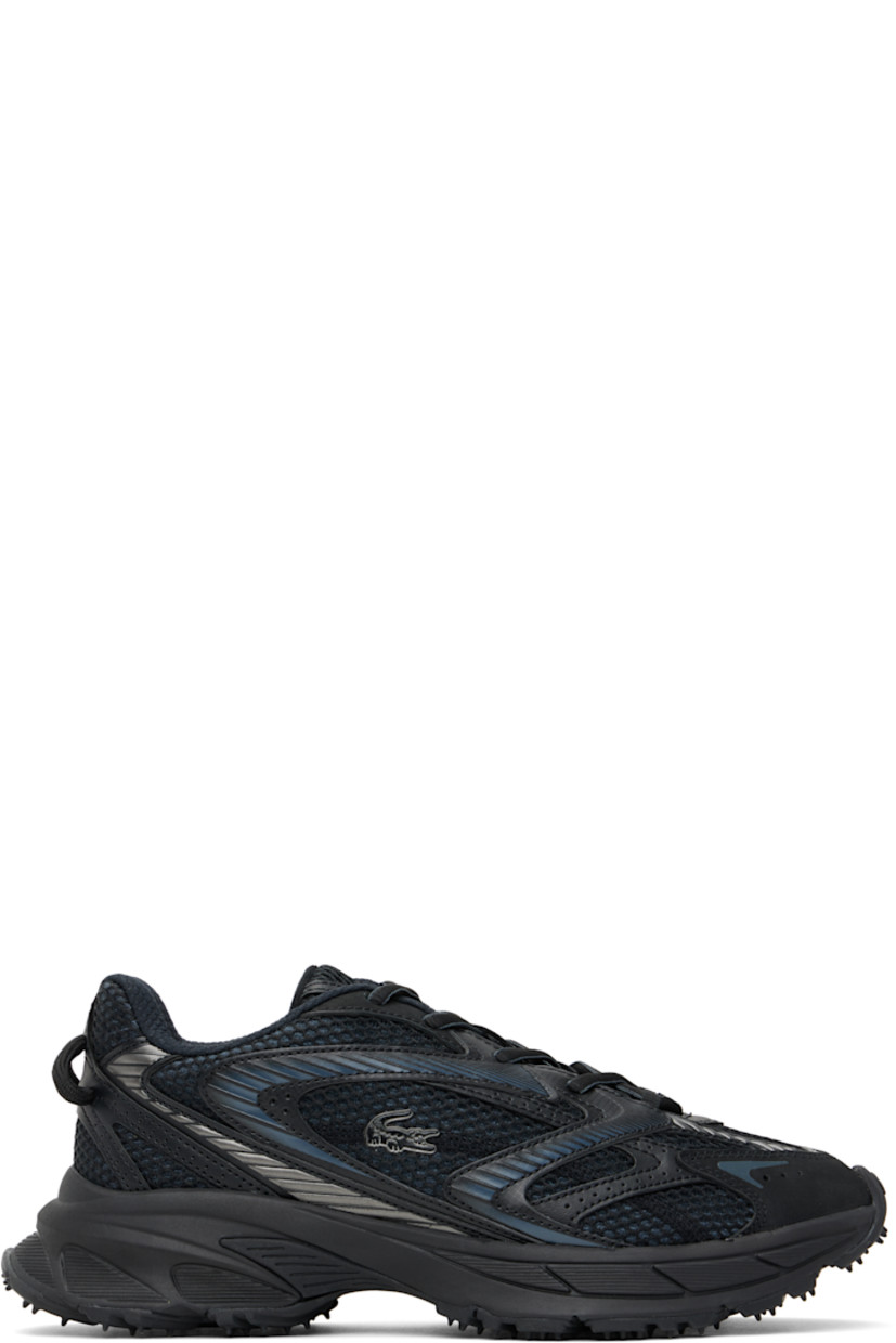 Low-top mesh, nubuck, and faux-leather sneakers in black.

· Perforations and reflective trim throughout
· Logo-embossed rubber trim at toe
· Lace-up closure
· Logo patch at padded tongue
· Padded collar
· Rubberized logo patch at outer side
· Pull-loops at heel tab
· Mesh lining
· Textured foam rubber midsole
· Treaded rubber sole

Supplier color: Blk/Blk