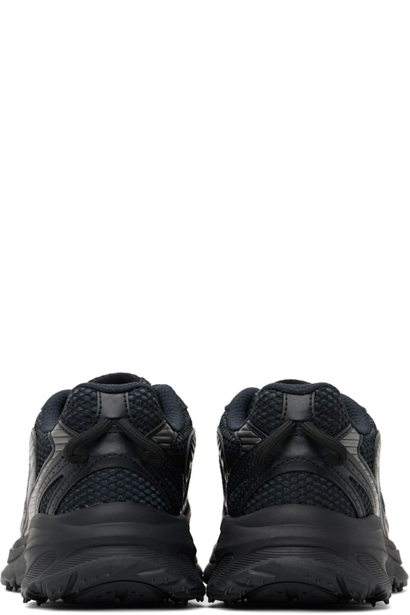 Low-top mesh, nubuck, and faux-leather sneakers in black.

· Perforations and reflective trim throughout
· Logo-embossed rubber trim at toe
· Lace-up closure
· Logo patch at padded tongue
· Padded collar
· Rubberized logo patch at outer side
· Pull-loops at heel tab
· Mesh lining
· Textured foam rubber midsole
· Treaded rubber sole

Supplier color: Blk/Blk