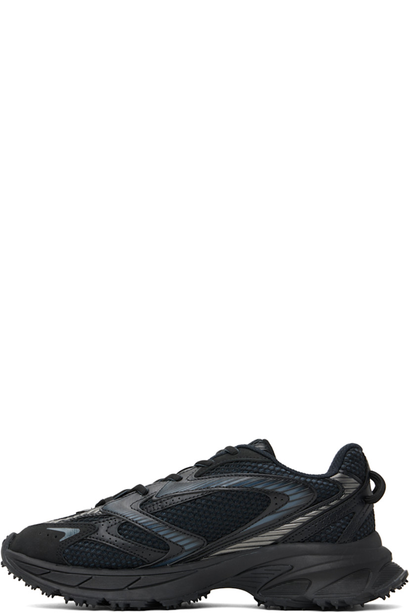Low-top mesh, nubuck, and faux-leather sneakers in black.

· Perforations and reflective trim throughout
· Logo-embossed rubber trim at toe
· Lace-up closure
· Logo patch at padded tongue
· Padded collar
· Rubberized logo patch at outer side
· Pull-loops at heel tab
· Mesh lining
· Textured foam rubber midsole
· Treaded rubber sole

Supplier color: Blk/Blk