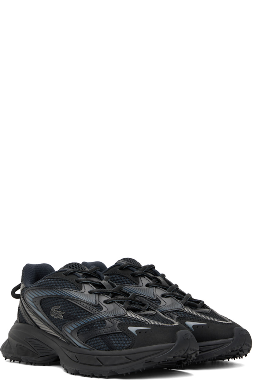 Low-top mesh, nubuck, and faux-leather sneakers in black.

· Perforations and reflective trim throughout
· Logo-embossed rubber trim at toe
· Lace-up closure
· Logo patch at padded tongue
· Padded collar
· Rubberized logo patch at outer side
· Pull-loops at heel tab
· Mesh lining
· Textured foam rubber midsole
· Treaded rubber sole

Supplier color: Blk/Blk
