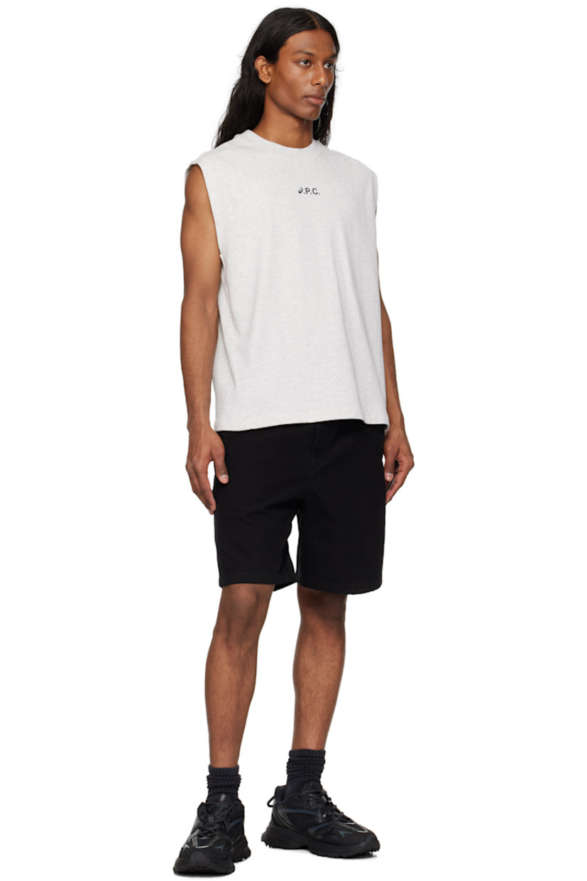 Low-top mesh, nubuck, and faux-leather sneakers in black.

· Perforations and reflective trim throughout
· Logo-embossed rubber trim at toe
· Lace-up closure
· Logo patch at padded tongue
· Padded collar
· Rubberized logo patch at outer side
· Pull-loops at heel tab
· Mesh lining
· Textured foam rubber midsole
· Treaded rubber sole

Supplier color: Blk/Blk